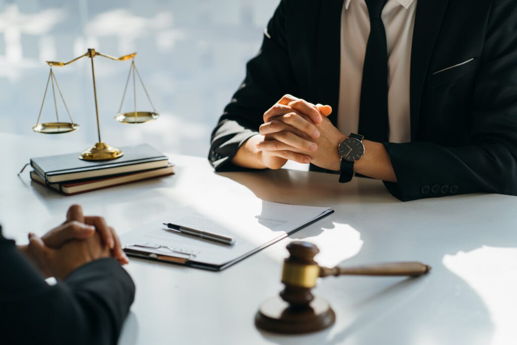 Montclair Prenuptial Agreement Lawyer meeting with a couple to discuss financial planning before marriage.
